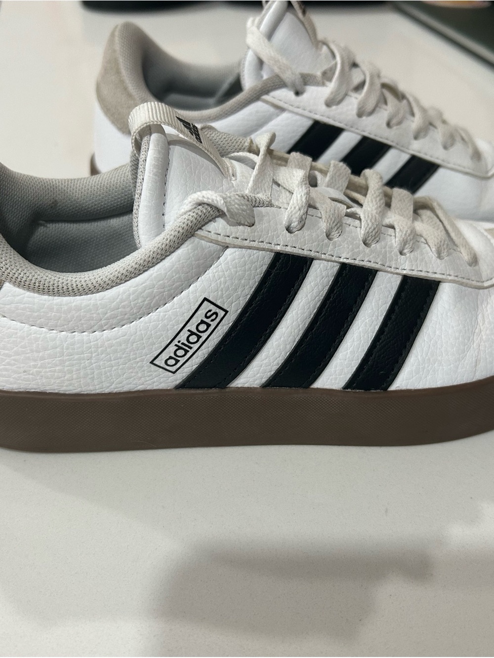 adidas White Sneakers with Black Stripes and Brown Sole